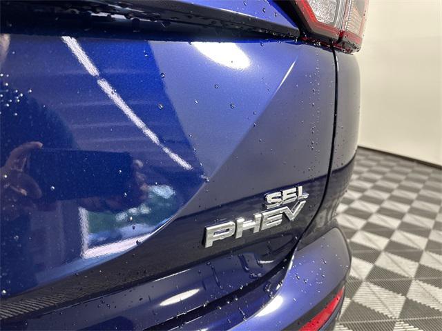 Photo of 2025 Cosmic Blue Metallic Mitsubishi Outlander PHEV