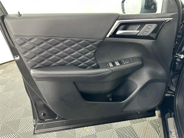 Photo of 2025 Labrador Black Pearl Mitsubishi Outlander PHEV