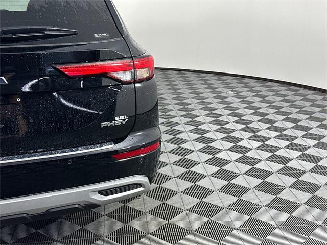 Photo of 2025 Labrador Black Pearl Mitsubishi Outlander PHEV