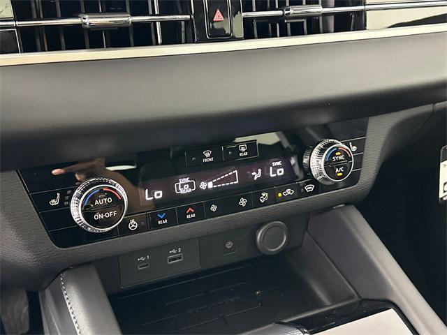 Photo of 2025 Labrador Black Pearl Mitsubishi Outlander PHEV