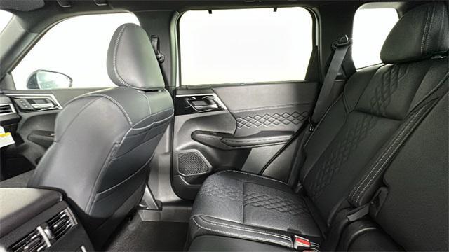 Photo of 2025 White Diamond Mitsubishi Outlander PHEV