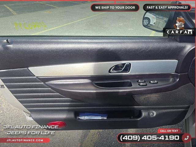 Photo of 2005 Cashmere Tri-Coat Clearcoat Metallic Ford Thunderbird