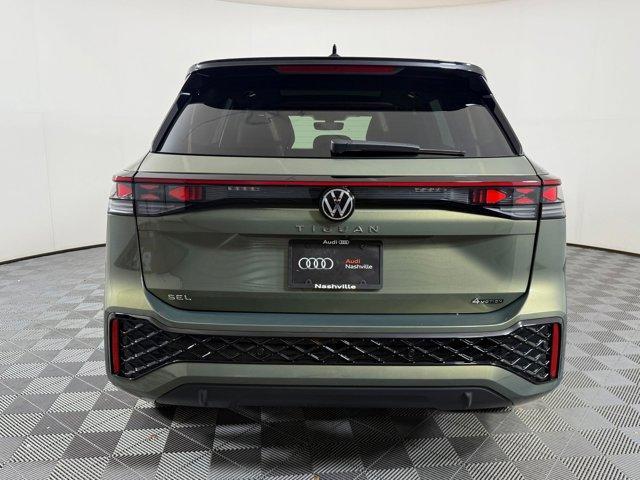 Photo of 2025 Avocado Green w/Deep Black Roof Volkswagen Tiguan