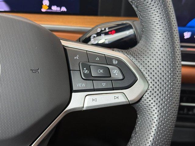 Photo of 2025 Avocado Green w/Deep Black Roof Volkswagen Tiguan