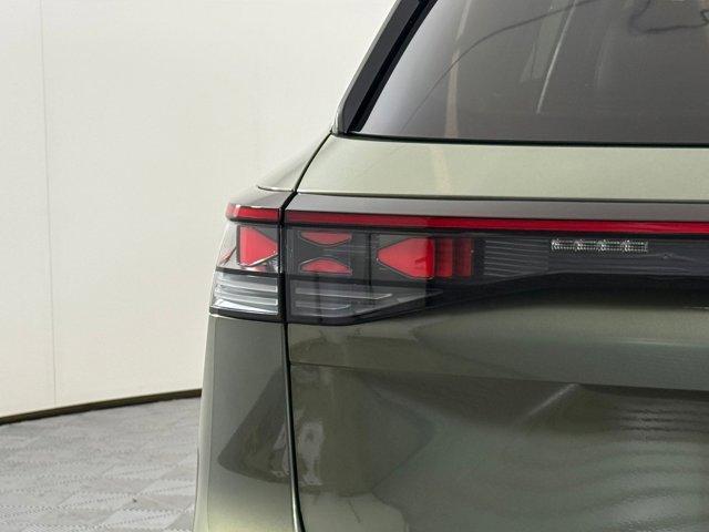 Photo of 2025 Avocado Green w/Deep Black Roof Volkswagen Tiguan