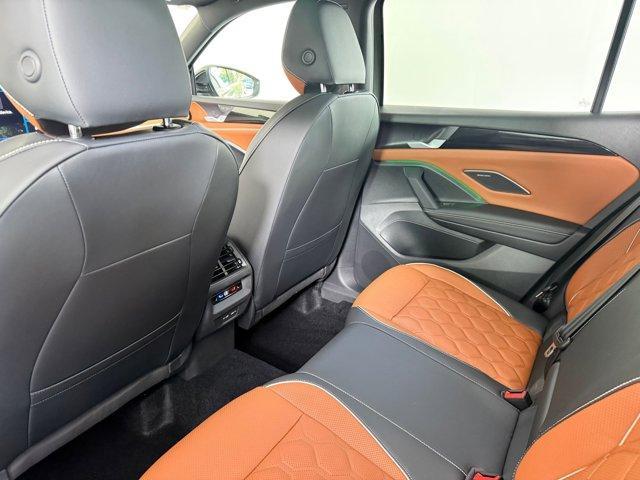 Photo of 2025 Avocado Green w/Deep Black Roof Volkswagen Tiguan