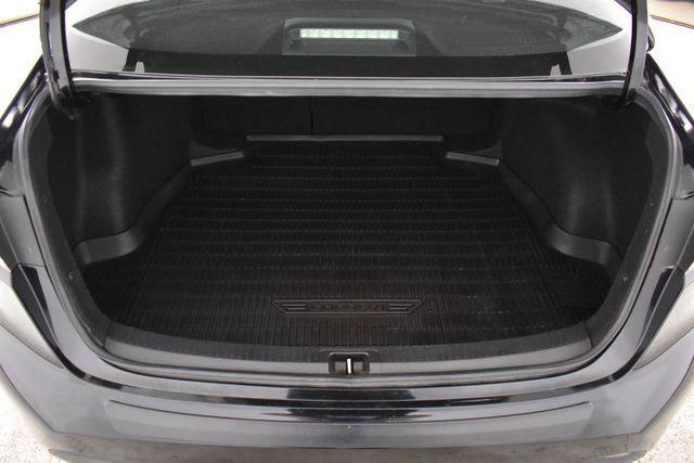 Photo of 2023 Midnight Black Metallic Toyota Corolla