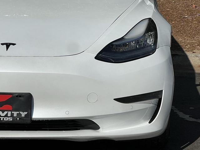 Photo of 2020 Pearl White Multi-Coat Tesla Model 3