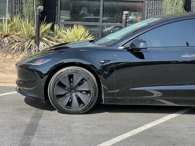 Photo of 2024 Solid Black Tesla Model 3