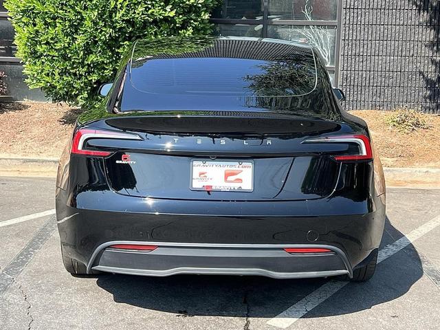 Photo of 2024 Solid Black Tesla Model 3