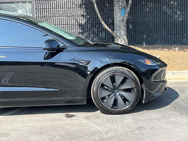 Photo of 2024 Solid Black Tesla Model 3
