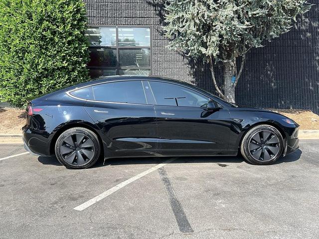 Photo of 2024 Solid Black Tesla Model 3