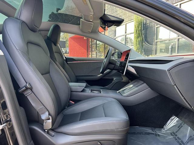 Photo of 2024 Solid Black Tesla Model 3