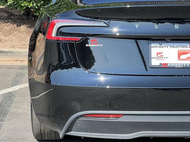 Photo of 2024 Solid Black Tesla Model 3