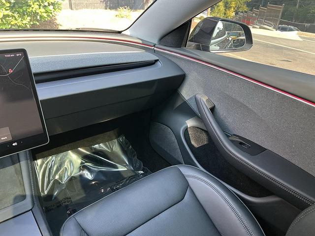 Photo of 2024 Solid Black Tesla Model 3