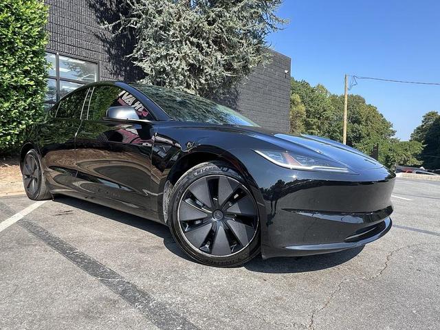 Photo of 2024 Solid Black Tesla Model 3