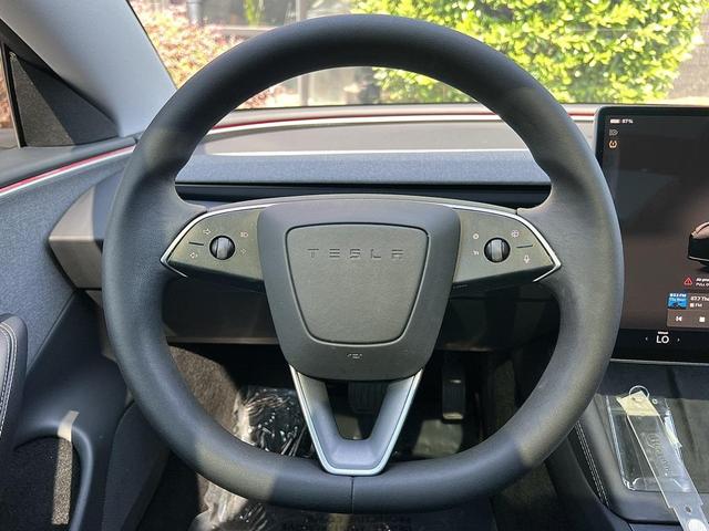 Photo of 2024 Solid Black Tesla Model 3