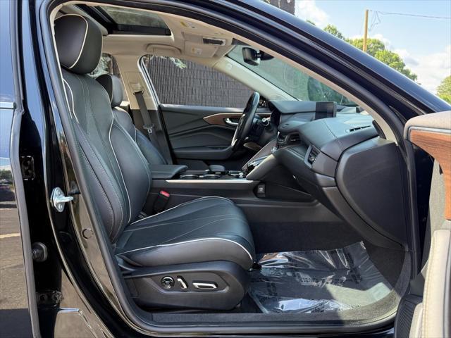 Photo of 2021 Black Acura TLX