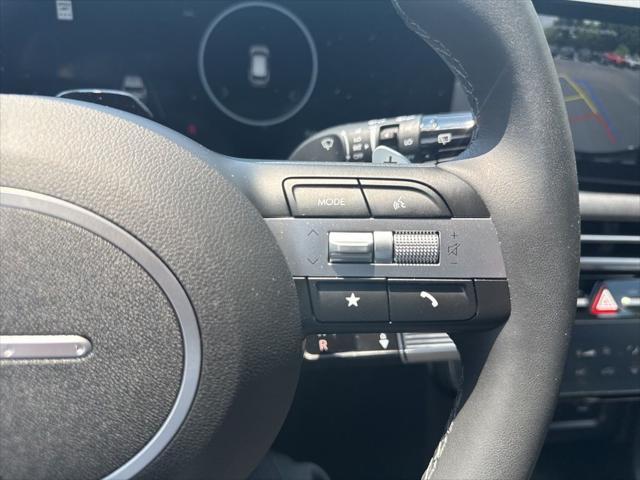 Photo of 2025 Deep Sea Hyundai TUCSON Hybrid