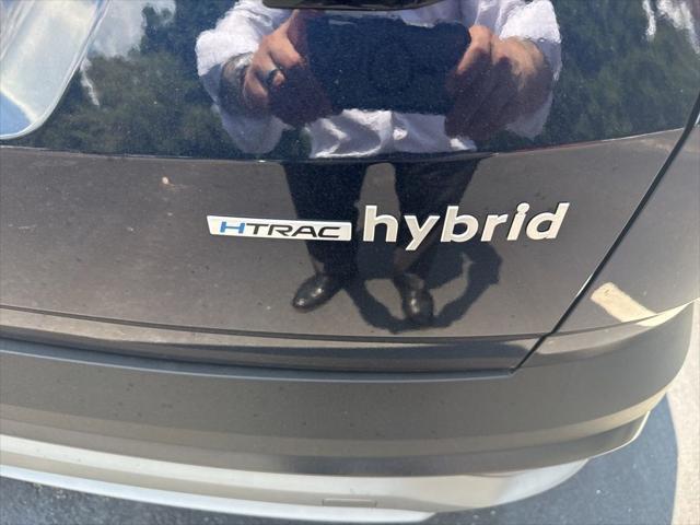 Photo of 2025 Deep Sea Hyundai TUCSON Hybrid