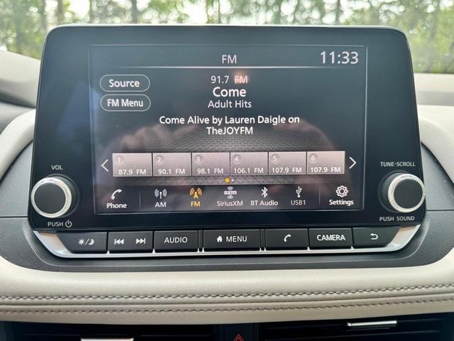 Photo of 2023 Scarlet Ember Tintcoat Nissan Rogue
