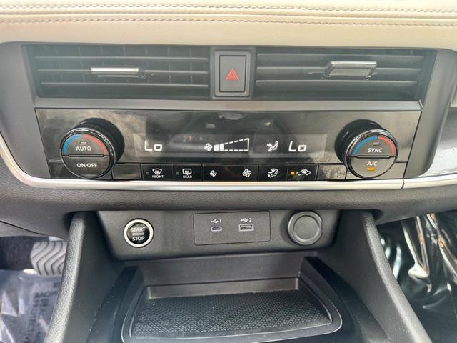 Photo of 2023 Scarlet Ember Tintcoat Nissan Rogue