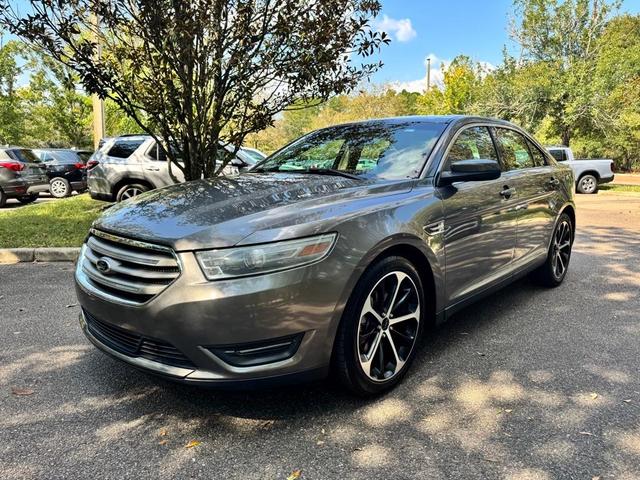 Photo of 2014 Sterling Gray Metallic Ford Taurus