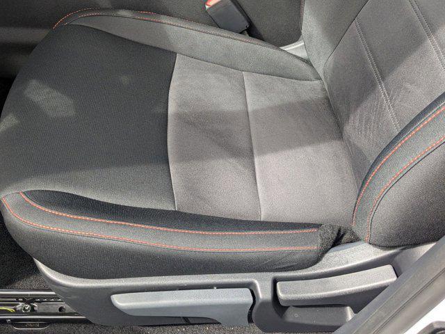 Photo of 2025 Aspen White Tricoat/Super Black Nissan Sentra