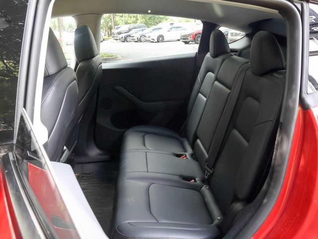 Photo of 2023 Red Multi-Coat Tesla Model Y