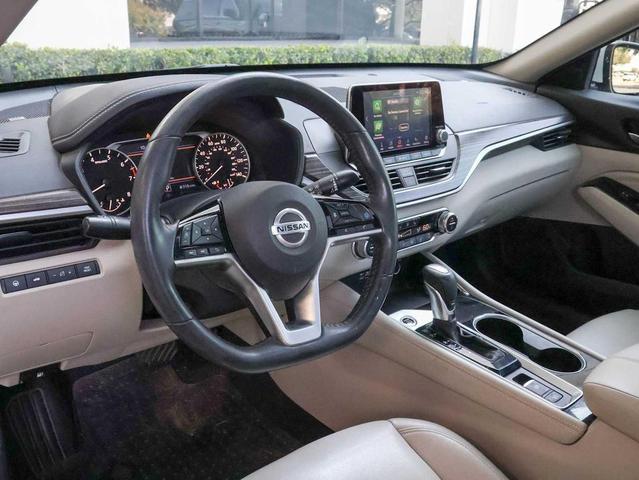 Photo of 2021 Pearl White Tricoat Nissan Altima