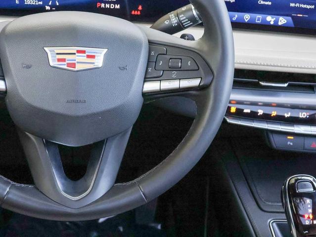 Photo of 2024 Stellar Black Metallic Cadillac XT4