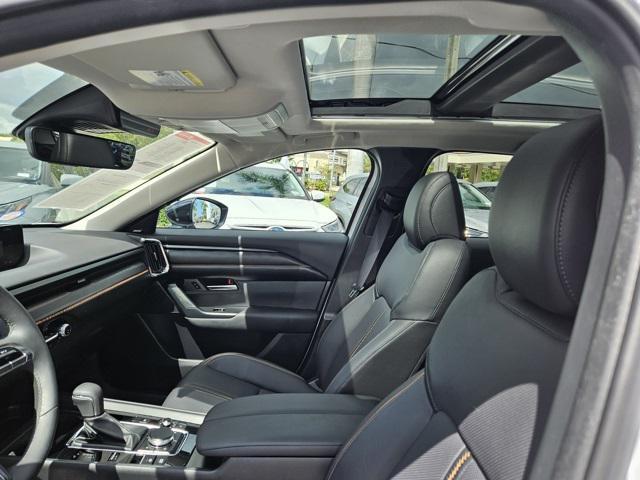 Photo of 2025 wind chill pearl Mazda CX-50 Hybrid