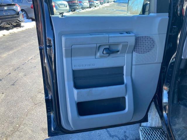 Photo of 2012 Black Ford E350 Super Duty