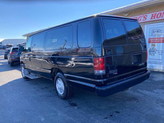 Photo of 2012 Black Ford E350 Super Duty