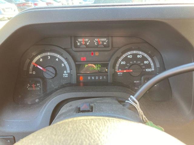 Photo of 2012 Black Ford E350 Super Duty