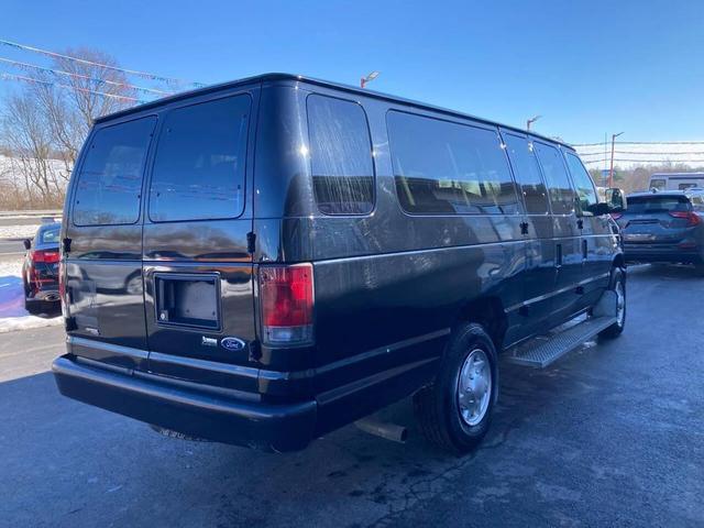 Photo of 2012 Black Ford E350 Super Duty