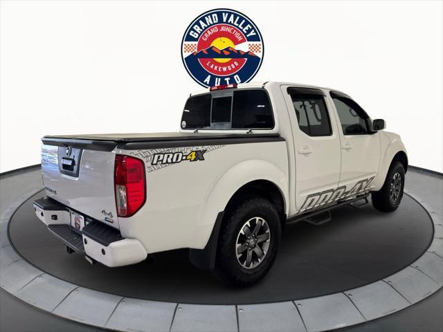 Photo of 2016 Glacier White Nissan Frontier