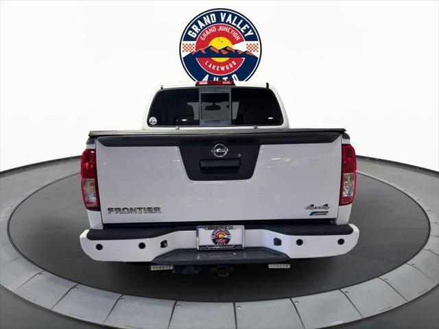 Photo of 2016 Glacier White Nissan Frontier