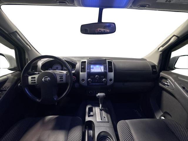 Photo of 2016 Glacier White Nissan Frontier