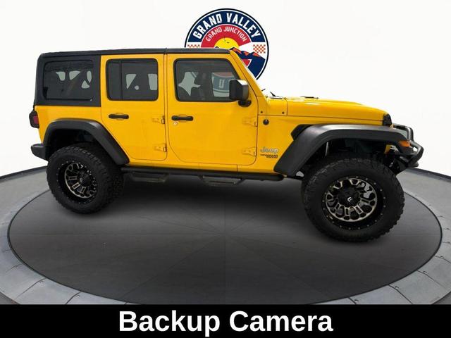 Photo of 2018 Baja Yellow Clearcoat Jeep Wrangler Unlimited