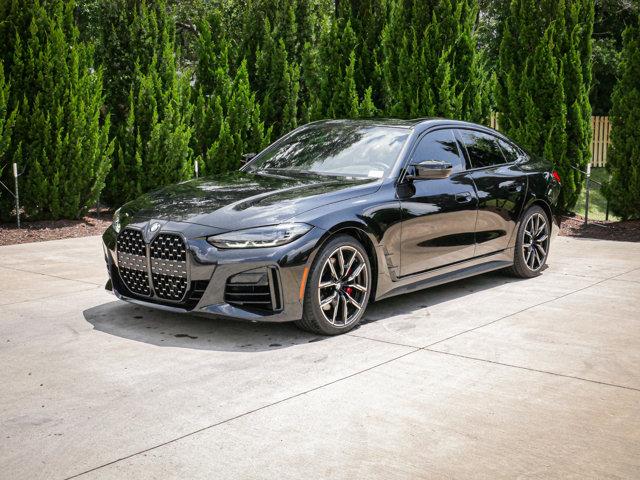 Photo of 2023 Black Sapphire Metallic BMW M440 Gran Coupe