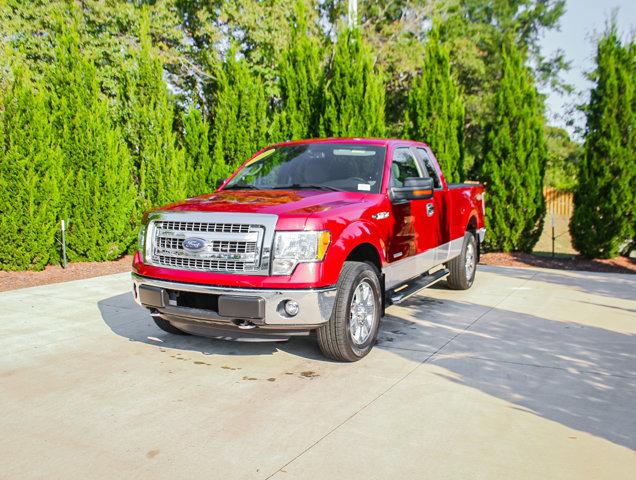 Photo of 2013 Ruby Red Metallic Tinted Clearcoat Ford F-150