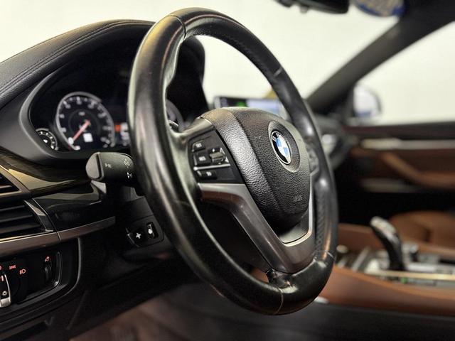 Photo of 2018 Black Sapphire Metallic BMW X6