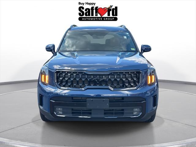 Photo of 2025 Midnight Lake Blue Kia Telluride