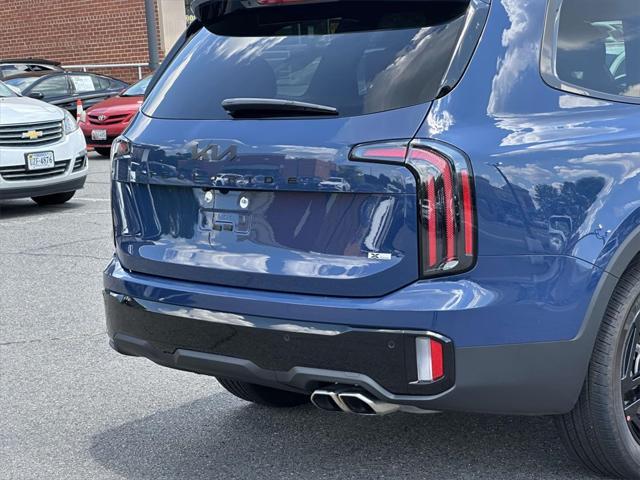 Photo of 2025 Midnight Lake Blue Kia Telluride