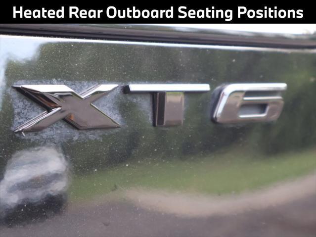 Photo of 2022 Stellar Black Metallic Cadillac XT6