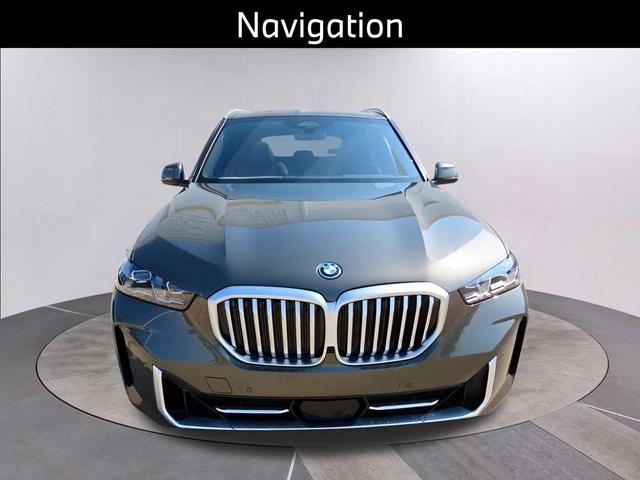 Photo of 2025 Manhattan Green Metallic BMW X5 PHEV