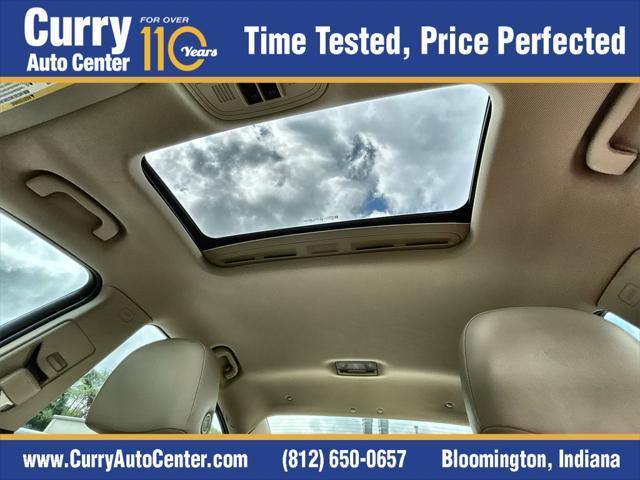 Photo of 2014 Crystal Red Tintcoat Buick Regal