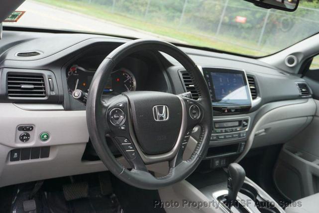 Photo of 2016 Steel Sapphire Metallic Honda Pilot