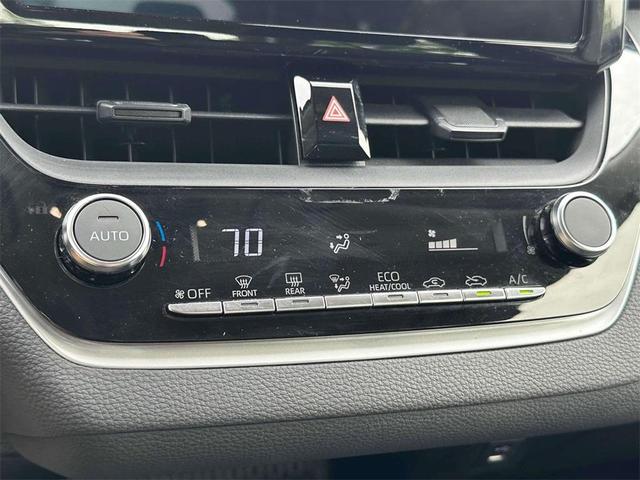 Photo of 2023 Midnight Black Metallic Toyota Corolla Hybrid
